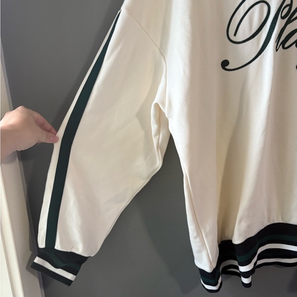 Divided size Large cream
Embroidered rugby shirt, “player” graphic, green stripe - Picture 4 of 8